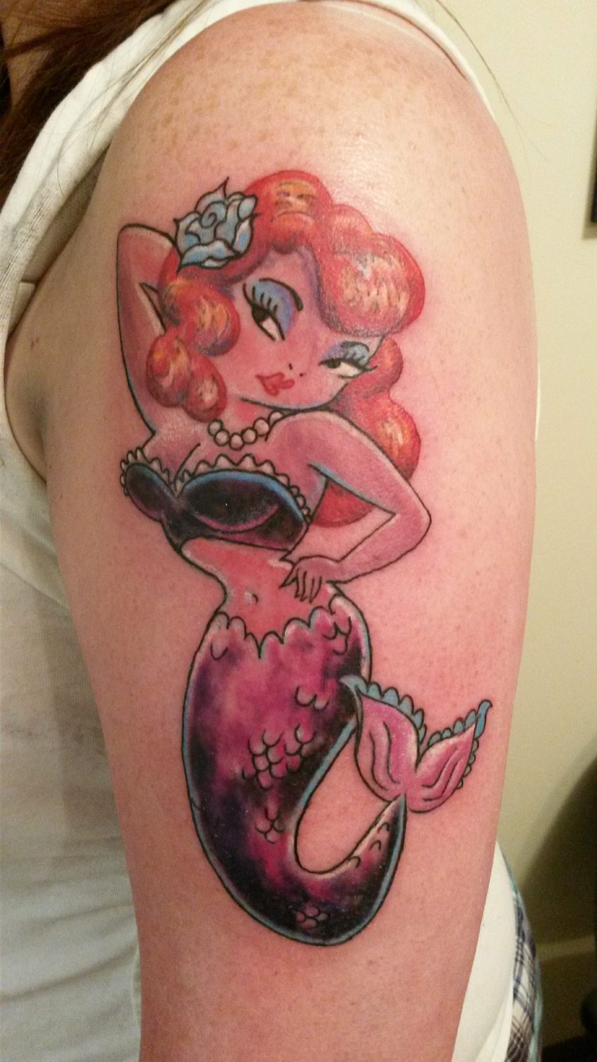 Colour mermaid pin-up tattoo on a shoulder, Parksville BC